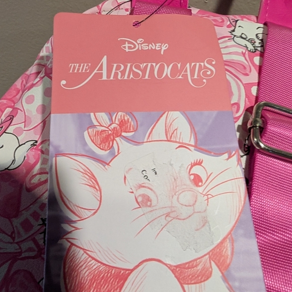 aristoxats mini backpack The Aristocats Marie House Roadkill13 This pink mini backpack has a stained glass design on the front Loungefly Disney The Aristocats Marie